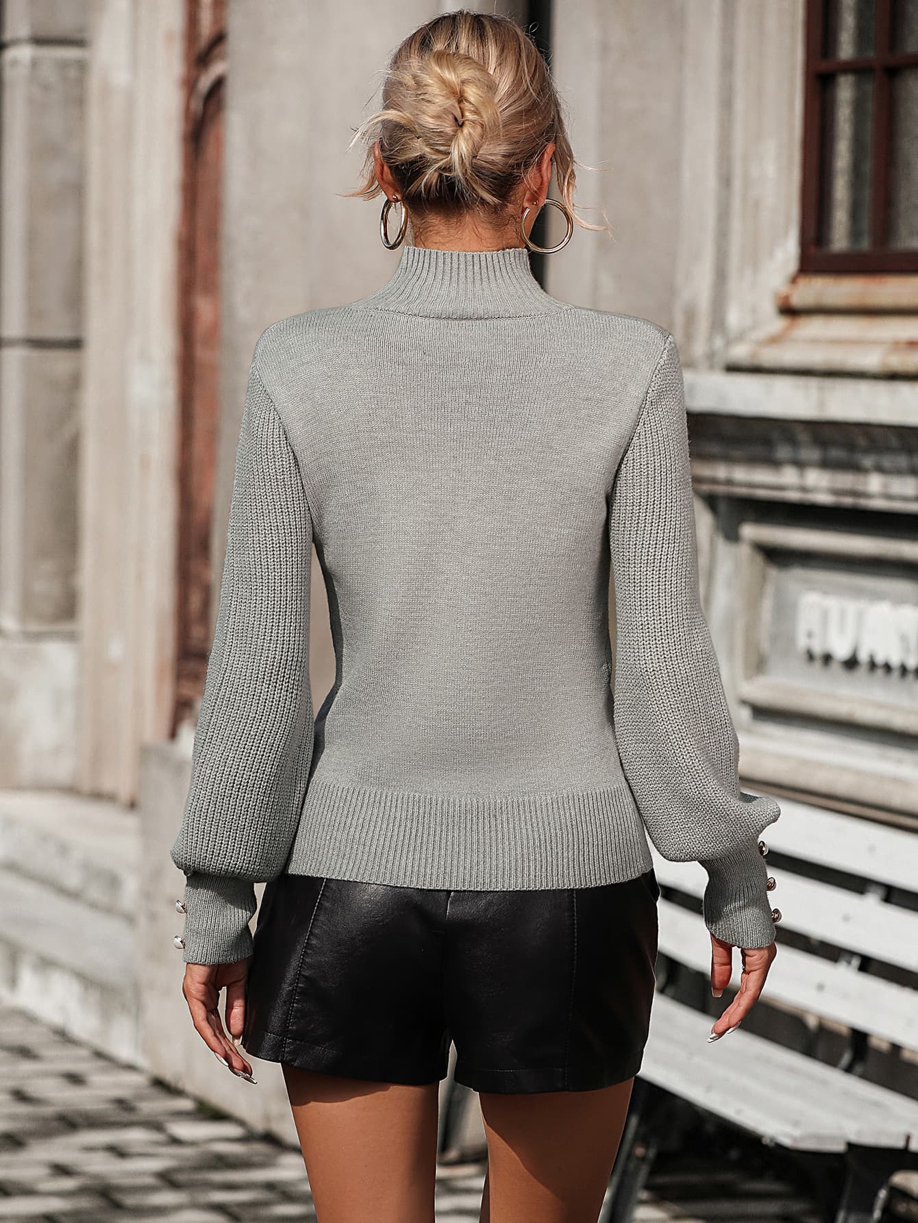 She-eo Ribbed Mock Neck Sweater