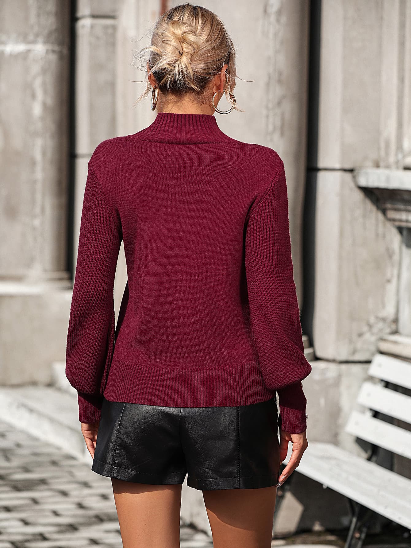 She-eo Ribbed Mock Neck Sweater